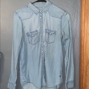 light colored button up jean  jacket